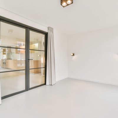 large-white-room-with-sliding-glass-doors-2021-12-09-14-05-53-utc